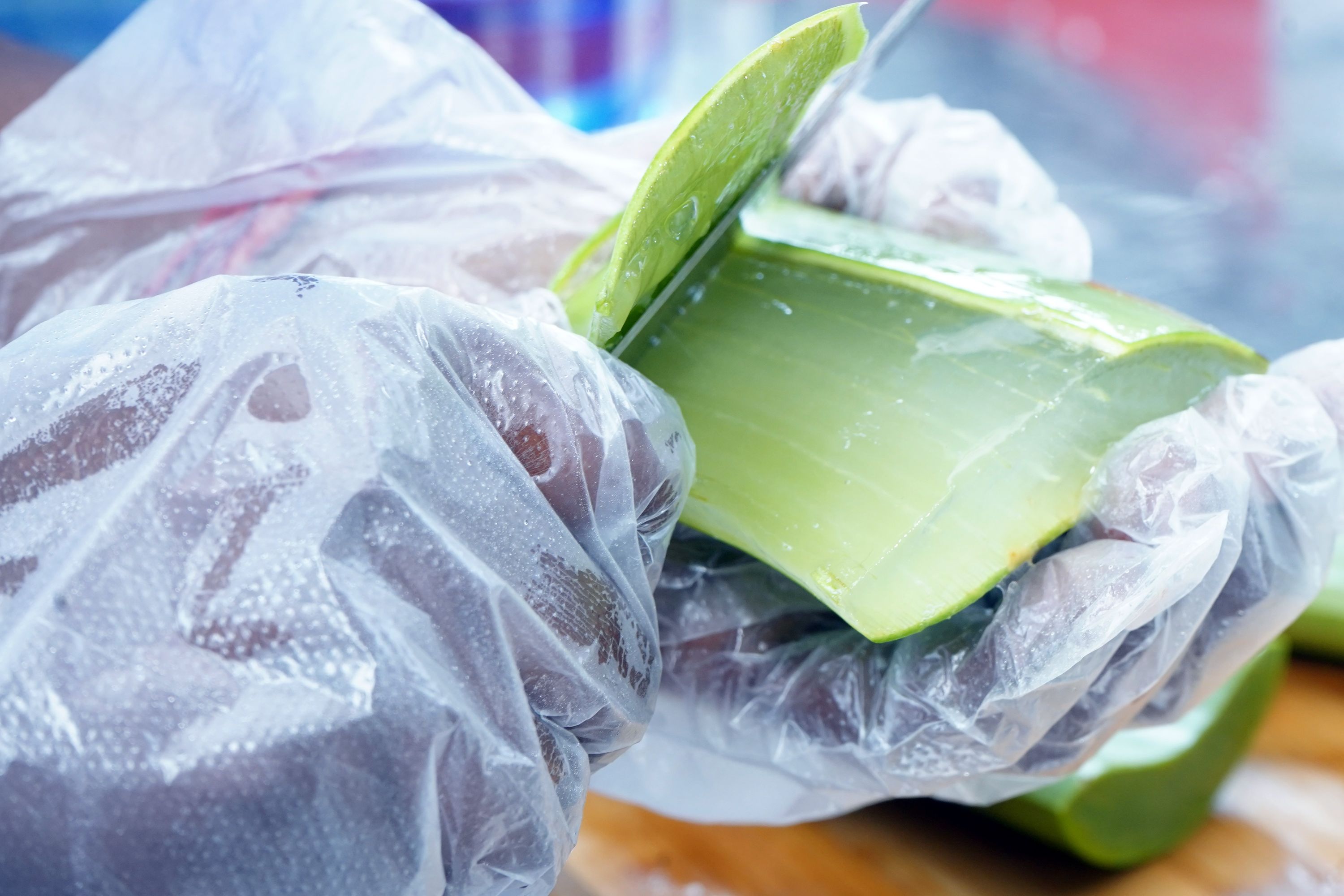 Close-up of pure aloe vera gel extracted from fresh leaves